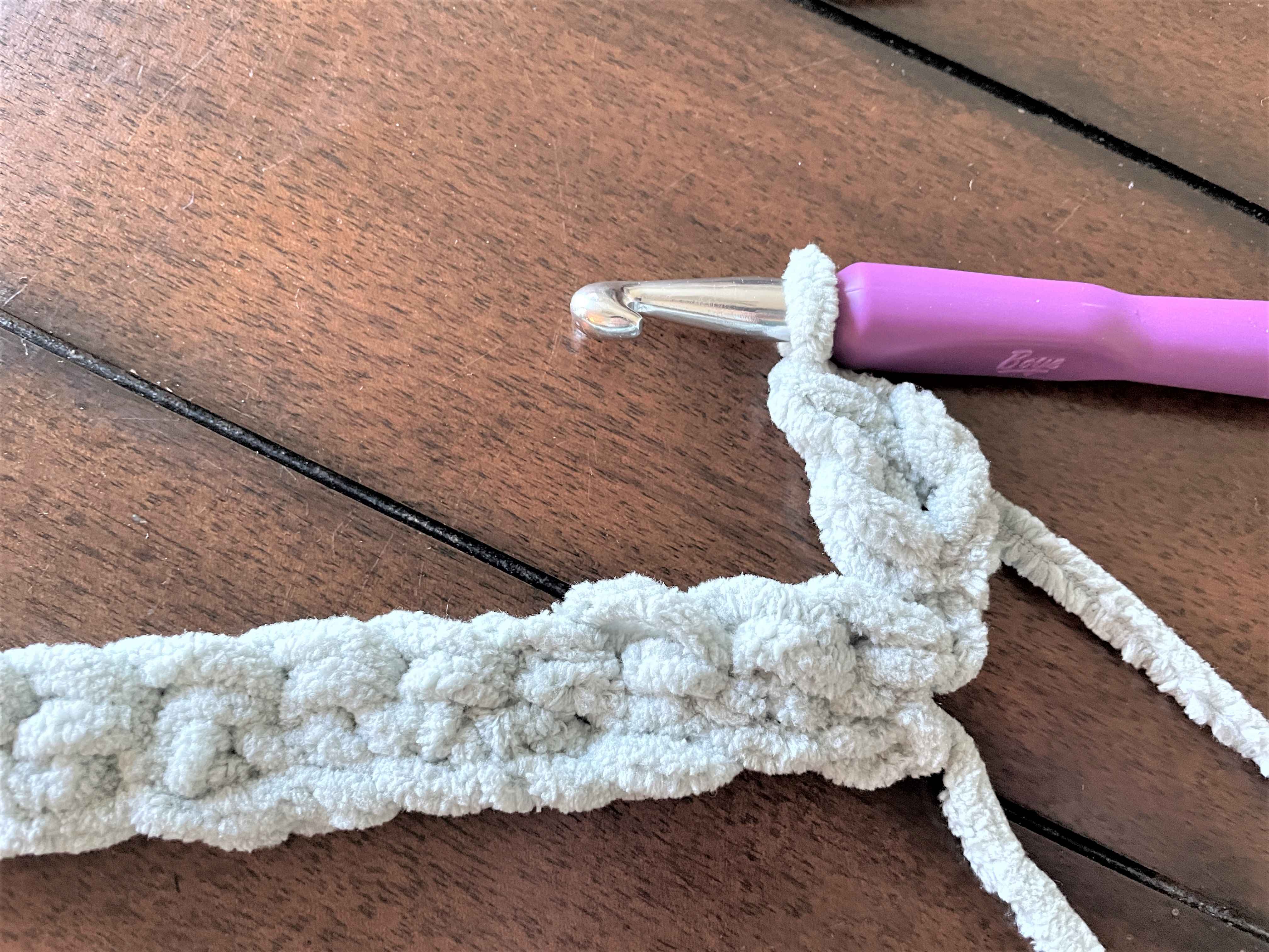 Chain 3 and then 1 DC in the same stitch