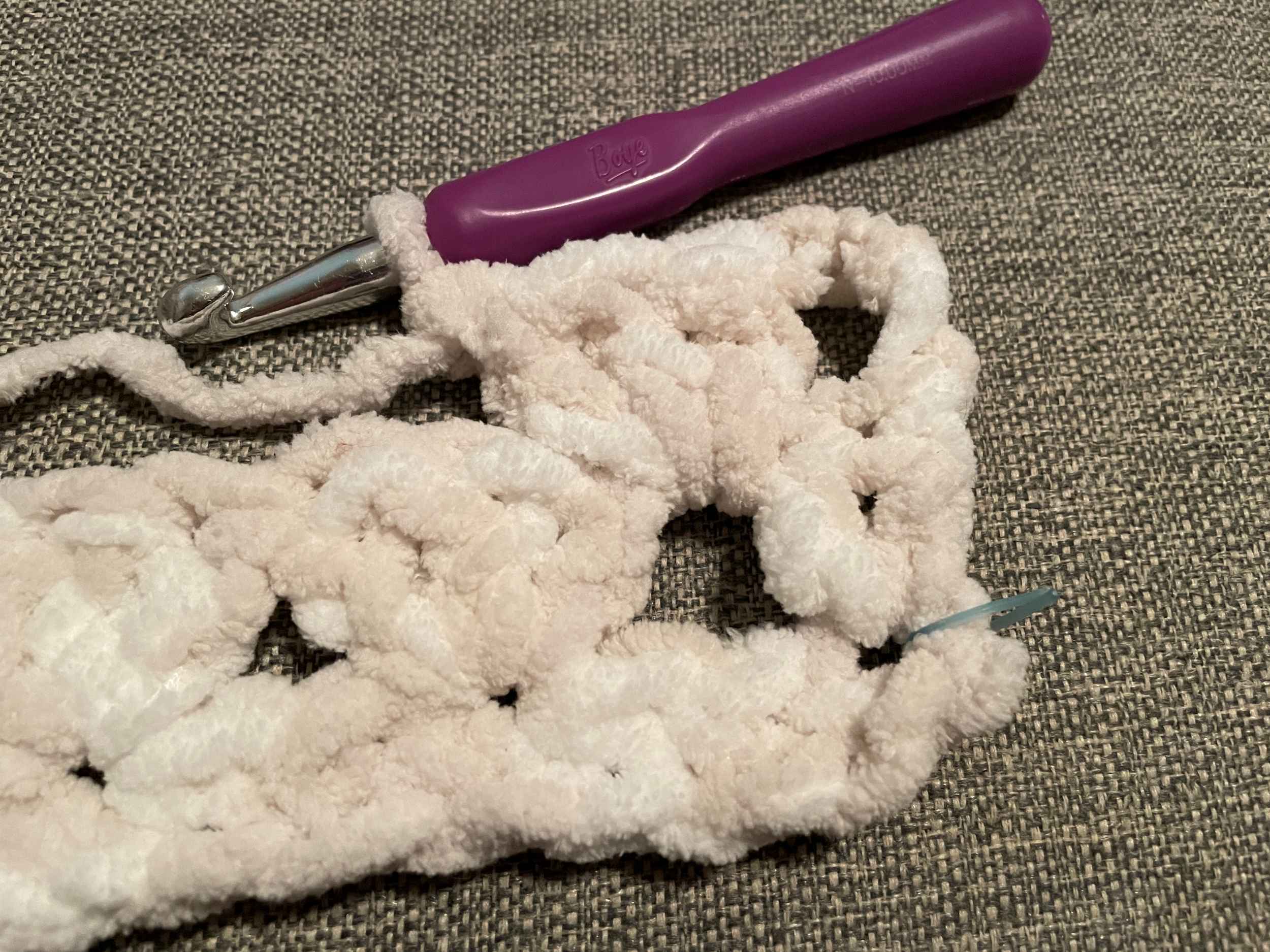 Cluster of 3 double Crochet stitches in the space of the row below